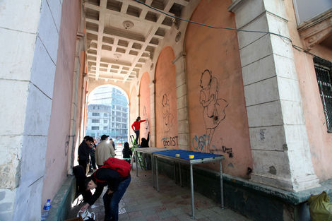<p>While in town for the sculpture unveiling, FAILE worked with local Mongolian artists on a mural. They stenciled an image of a young girl clutching a skateboard – a nod to the quickly modernizing nature of Mongolia contrasted by its vast unpaved landscape – on the wall of an archway located in the central university district of Ulan Bator. Each Mongolian artist worked on customizing the girl’s dress in their own style. The emerging Mongolian artists are recent finalists of the Tiger Translate Festival and were selected by a prestigious panel of judges that included the National Arts Council.</p>