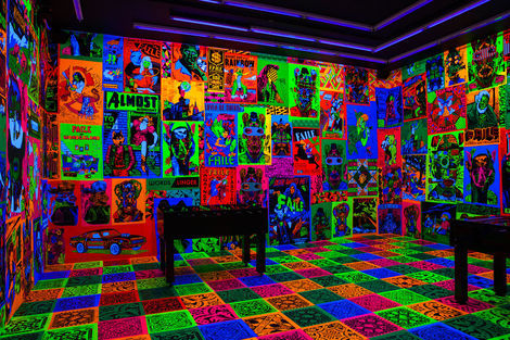 <p>The FAILE &amp; BAST Deluxx Fluxx Arcade<br/>
Black Light Room</p>